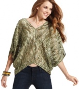 Couture inspiration is in full supply on this oversized, knit pullover from Jessica Simpson!