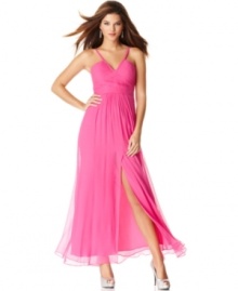 BCBGMAXAZRIA's evening gown is totally magnetic with a bright, bold color and gorgeous, graceful design details. BCBGMAXAZRIA's evening gown is totally magnetic with a bright, bold color and gorgeous, graceful design details.