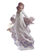 The belle of the spring ball, this glamorous young beauty dons an enormous skirt and fitted bodice fashioned in handcrafted Lladro porcelain.