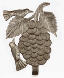 Perfect for your kitchen, the breadfruit wall hook is hand cut, carved and varnished by the Haitian artist to celebrate a plant whose fruit feeds billions every day. Hang aprons, pot holders or kitchen towels. Perfect for your kitchen, the breadfruit wall hook is hand cut, carved and varnished by the Haitian artist to celebrate a plant whose fruit feeds billions every day. Hang aprons, pot holders or kitchen towels.