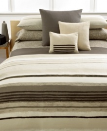 Layer your bed in plush texture with this coverlet from Calvin Klein, boasting a sumptuous quilted pattern in a rich brown solid. Layer your bed in plush texture with this coverlet from Calvin Klein, boasting a sumptuous quilted pattern in a rich brown solid.