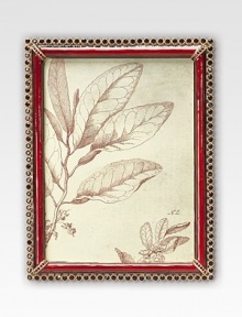 An heirloom-quality frame destined to appoint a treasured photograph, individually crafted in goldplated pewter with handset Swarovski crystals. 5% of the retail price of each piece sold will be donated to support the work of the Breast Cancer Research Foundation. Accommodates a 5 X 7 photograph Overall, 6 X 8 Made in USA 