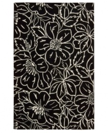 Striking ivory outlines render a high-style floral motif that pops against a jet-black ground. This Nourison rug is hand-tufted from premium-quality wool and meticulously hand-carved for a lush dimensional effect, every detail coming together to create a bold focal point in any setting. Striking ivory outlines render a high-style floral motif that pops against a jet-black ground. This Nourison rug is hand-tufted from premium-quality wool and meticulously hand-carved for a lush dimensional effect, every detail coming together to create a bold focal point in any setting.