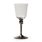 Mouth-blown by artisans in the hills outside Prague, this faceted goblet sits atop a regal hand-painted platinum stem.