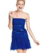 A ruffled hem and subtle dose of sequins add charm to this strapless party dress from Roberta!