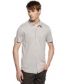 Stay on point with casual style with this roll tab sleeve shirt from Kenneth Cole Reaction.