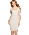 Elongating princess seams plus a waist-cinching belt bring structured elegance to this sheath dress from XOXO!