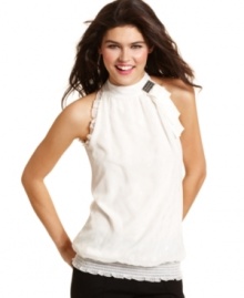 A high neckline and ruffled accents unite in polished elegance on this polka-dot-print top from BCX. A high neckline and ruffled accents unite in polished elegance on this polka-dot-print top from BCX.