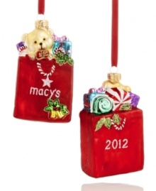 Embrace the holiday frenzy with the Macy's shopping bag ornament. Stuffed with dazzling gifts and dated for the season, it's a perfect stocking stuffer for the shopaholics on your list. Shown front and back. Embrace the holiday frenzy with the Macy's shopping bag ornament. Stuffed with dazzling gifts and dated for the season, it's a perfect stocking stuffer for the shopaholics on your list. Shown front and back.