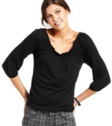 A ruffled neckline adds adorable style to this every day top from Belle Du Jour!