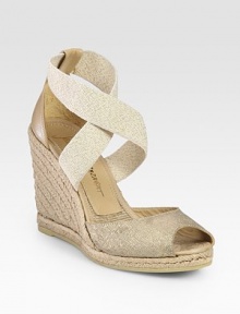 Glimmering canvas straps with leather trim vitalize a natural espadrille wedge. Hemp-covered wedge, 4 (100mm)Covered platform, ½ (15mm)Compares to a 3½ heel (90mm)Canvas and leather upperLeather and hemp liningRubber soleImportedOUR FIT MODEL RECOMMENDS ordering one half size up as this style runs small. 