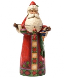From gift-giver to decorator, Old Saint Nick does it all! A folk rendition of the classic red suit adorns this thoughtful Santa as he gets ready to add a touch of cheer to your winter wonderland. From gift-giver to decorator, Old Saint Nick does it all! A folk rendition of the classic red suit adorns this thoughtful Santa as he gets ready to add a touch of cheer to your winter wonderland.