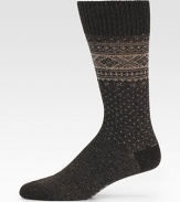 A timeless Nordic pattern is woven with the luxurious touch of merino wool. Ribbed toplineMid-calf height80% merino wool/20% polyamideMachine washMade in Germany