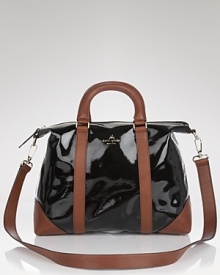 Practical style gets glossy with this patent leather satchel from kate spade new york. Ideal for the woman on the go, it's polished with a camel coat and pumps.