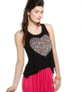 Show your big heart in a fashionable way with this asymmetrical tank top from Material Girl! Looks super cute with a hot mini or jeans!