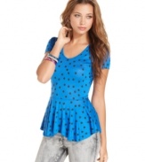 Effortlessly playful, this this peplum top from Fresh Brewed mixes fun polkadots with a cool, cage-back design!
