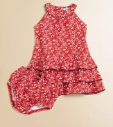 Cherries and a paisley print adorn this pretty ruffled frock with scalloped detail in a drop-waist silhouette.Scalloped jewelneckSleevelessBack buttonsDrop-waistRuffled skirt95% cotton/5% spandexMachine washImported Please note: Number of buttons may vary depending on size ordered. 