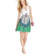 A bold floral print brings bright summer style to this Desigual dress -- perfect for a standout look!