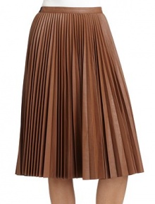THE LOOKAllover accordion pleated faux leather constructionBanded waistA-line silhouetteTHE FITAbout 26 from waist to hemTHE MATERIALPolyurethane/rayonFully linedCARE & ORIGINDry cleanImportedModel shown is 5'10 (177cm) wearing US size Small. 