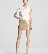 This Laundry by Shelli Segal dress features a gorgeously draped bodice punctuated by a sparkling sequin skirt.