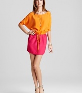 Juicy hues add a bold kick to this dolman sleeve Twelfth Street by Cynthia Vincent dress. Add a gold pendant and an armful of bangles for cocktail-ready style.