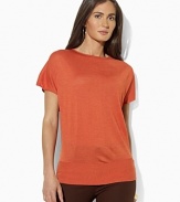 Rendered in sumptuous tussah silk, a boatneck top is finished with short dolman sleeves for a modern look.
