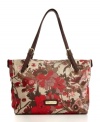 This prettily eye-popping satchel features a 60s-inspired floral print to put a happy spin on everyday errands.