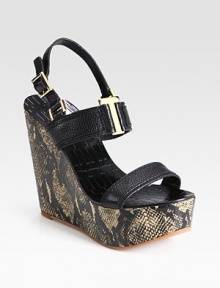 Pebbled leather straps with an adjustable slingback, connected with goldtone hardware and uplifted by a snake-print leather wedge. Snake-print leather wedge, 5 (125mm)Covered platform, 1½ (40mm)Compares to a 3½ heel (90mm)Pebbled leather upperLeather liningRubber soleImported Pebbled leather straps with an adjustable slingback, connected with goldtone hardware and uplifted by a snake-print leather wedge. Snake-print leather wedge, 5 (125mm)Covered platform, 1½ (40mm)Compares to a 3½ heel (90mm)Pebbled leather upperLeather liningRubber soleImported