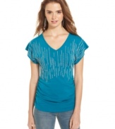 Tiny, pearl-like beads stream down the bodice of this tee from Curious Gypsy, creating fun design on a closet staple!