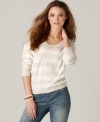 This DKNY Jeans crewneck sweater gets a girly makeover, thanks to dainty pointelle knit at the shoulders. Try it with denim in a lighter wash for a classic springtime look.