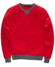 Cable guy. This sweater from Sean John elevates a classic look with cool, streetwise styling.