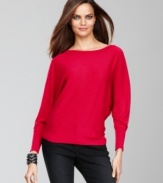 The slouchy-chic fit of INC's dolman-sleeve sweater makes a cool counterpoint to the sparkling, metallic-flecked fabric.