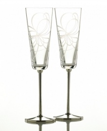 Enjoy a crisp toast with this delightfully elegant pair of champagne flutes. In clear crystal, this set features the finely cut ribbon motif of the Belle Boulevard collection. Enjoy a crisp toast with this delightfully elegant pair of champagne flutes. In clear crystal, this set features the finely cut ribbon motif of the Belle Boulevard collection.