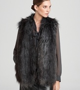 Take a walk on the wild side in a plush DKNY faux-fur vest. Slip it over everyday looks for instant exotic chic.