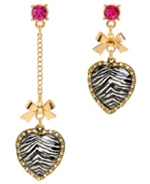 The fiercest of fashionistas. Betsey Johnson's mismatch earrings combine wild zebra stripes with 80s-influenced design. Crafted in gold tone mixed metal with bow accents and hot pink crystals. Approximate drops: 1-3/4 inches and 3 inches.