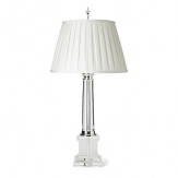 Elegant in its architectural design, this table lamp with polished silver atop a crystal base lights up any room.