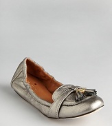 Slip into these fashionable and oh-so flexible kate spade new york loafers and you might never take them off. Metallic leather makes them shine.