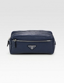 Travel case designed in superior Italian calfskin leather.Top zip closureExterior zip pocketsLogo lining9¼W x 4H x 5Made in Italy DUE TO HIGH DEMAND, A CUSTOMER MAY ORDER NO MORE THAN 3 UNITS OF THIS ITEM EVERY THIRTY DAYS. 