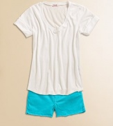 A little rough around the edges, this frayed pair of vivid shorts will take her from the classroom to the schoolyard in style.Button closureWaistband with belt loopsZip fly5-pocket styleFrayed hem96% cotton/4% spandexMachine washImported