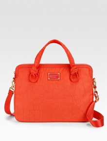 Signature quilted nylon is at the center of this design, complete with a logo plaque and elegantly-knotted top handles. Zip-around closureDouble top handles, 4 dropAdjustable, detachable shoulder strap, 9-20½ dropFully lined15W X 11¼H X 1½DImportedPlease note: Laptop not included. Signature quilted nylon is at the center of this design, complete with a logo plaque and elegantly-knotted top handles. Zip-around closureDouble top handles, 4 dropAdjustable, detachable shoulder strap, 9-20½ dropFully lined15W X 11¼H X 1½DImportedPlease note: Laptop not included.