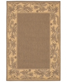 Create your own island retreat with this beige area rug, bordered in calming images of sand and palm trees. Great for patios, decks or vacation homes, the Recife rug can go almost anywhere! Power-loomed of Couristan's durable polypropylene blend, this soft piece is pet-friendly and resistant to mold and mildew.