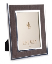 Make memories beautiful. The impeccably tailored Knotting Hill picture frame combines a traditional herringbone pattern with timeless silver plate. From Lauren Ralph Lauren. Make memories beautiful. The impeccably tailored Knotting Hill picture frame combines a traditional herringbone pattern with timeless silver plate. From Lauren Ralph Lauren.