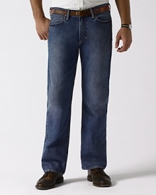 Classic-fitting jean in rugged cotton denim, washed for softness. Standard-rise belted waist, zip fly with signature shank. Classic straight leg. Five-pocket jean styling with metal rivets. Polo's signature canvas patch accents the back waist. Classic-fitting jean in rugged cotton denim, washed for softness. Standard-rise belted waist, zip fly with signature shank. Classic straight leg. Five-pocket jean styling with metal rivets. Polo's signature canvas patch accents the back waist.