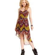 Get your street-chic fashion fix with a dress that unites the season's hottest trends: tribal-print and high-low design! From American Rag.