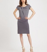 Asymmetrical pleating, side ruching and a trendy ombré print enliven this soft jersey silhouette. ScoopneckShort sleevesSide ruchingAbout 24 from natural waist52% polyester/48% cottonDry cleanImportedModel shown is 5'10 (177cm) wearing US size Small.