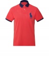 A modern update of the classic polo shirt, this stylish iteration will be a go-to casual basic - Contrasting spread collar and cuffs, front button half placket, large logo detail, asymmetrical hem, side vent - Style with chinos, boat shoes, and a cashmere cardigan
