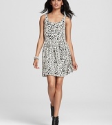 A timeless leopard print takes form in a black and white palette on Aqua's ponte knit, everyday-wear dress.