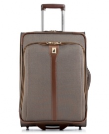 The travelin' is easy! Durable and lightweight, this stylish essential sits on 4 easy-glide wheels and has an expandable design, so everything from prepping to jetting away is simple. Open this versatile piece for a world of packing possibility, such as a unique suiter clip to keep clothes hanging neatly, shoe pockets to keep organization in place and zippered storage pockets to create a space for every accessory. 10-year warranty. The travelin' is easy! Durable and lightweight, this stylish essential sits on 4 easy-glide wheels and has an expandable design, so everything from prepping to jetting away is simple. Open this versatile piece for a world of packing possibility, such as a unique suiter clip to keep clothes hanging neatly, shoe pockets to keep organization in place and zippered storage pockets to create a space for every accessory. 10-year warranty.