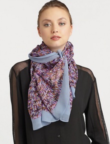 A colorful abstract print with a thick, solid border in luxurious silk georgette. SilkAbout 53 X 71Dry cleanImported 