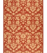 Safavieh takes classic beauty outside of the home with this elegant rug, created with a specially designed sisal weave. In vibrant paprika red with natural accents, this beautiful piece makes the most of any outdoor patio, porch or balcony. (Clearance)